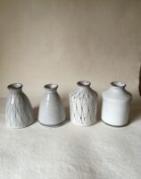 Hand thrwon terracotta vases by Rye Pottery Featuring hand painted bands or Sgrafitto scratch through decoration