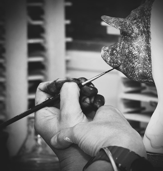 Rye Pottery's Mother Pig being hand painted in their studio in Rye